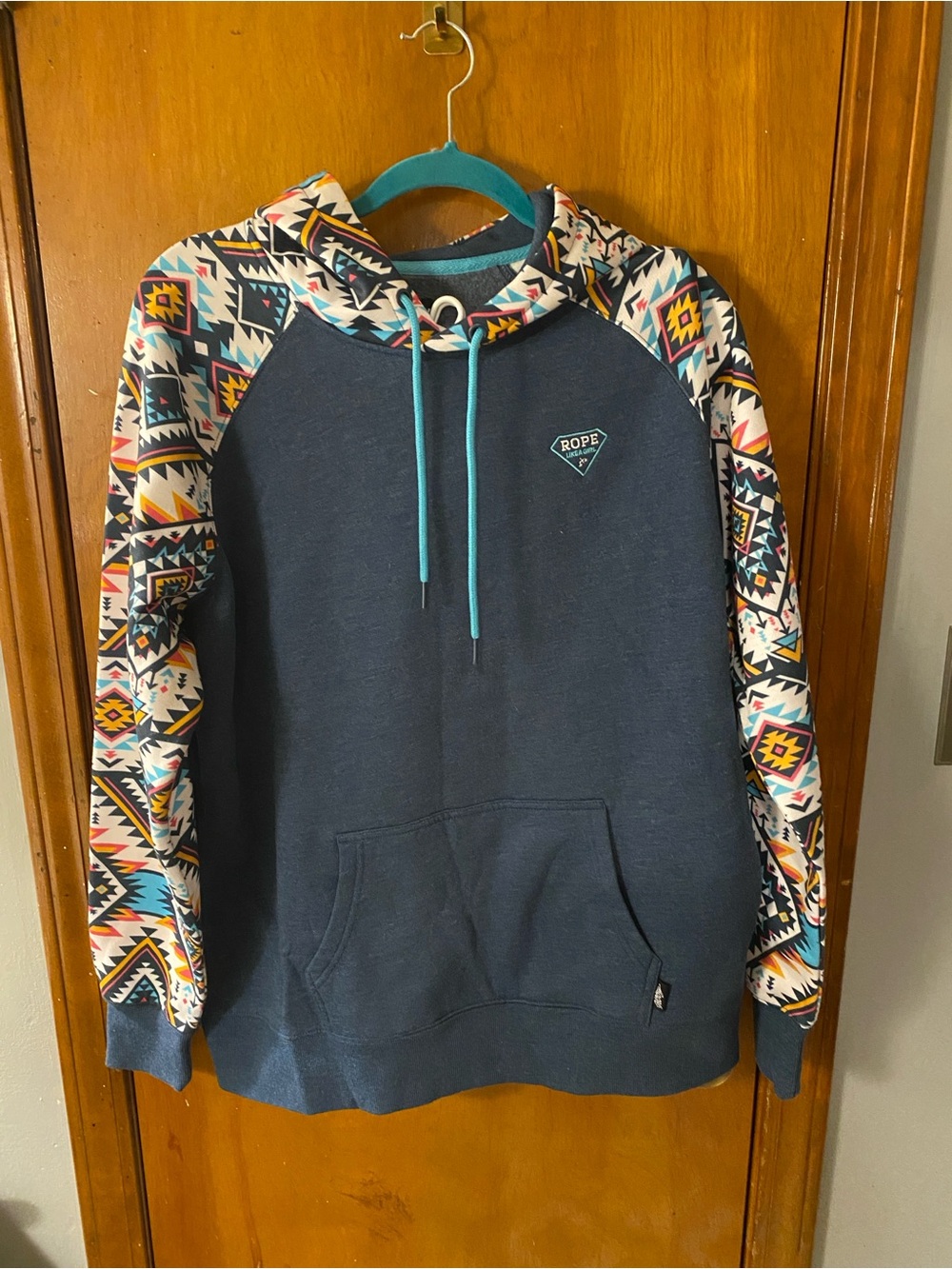 Hooey Navy Crewneck Sweatshirt with Aztec-Print Sleeves and Teal Drawstrings